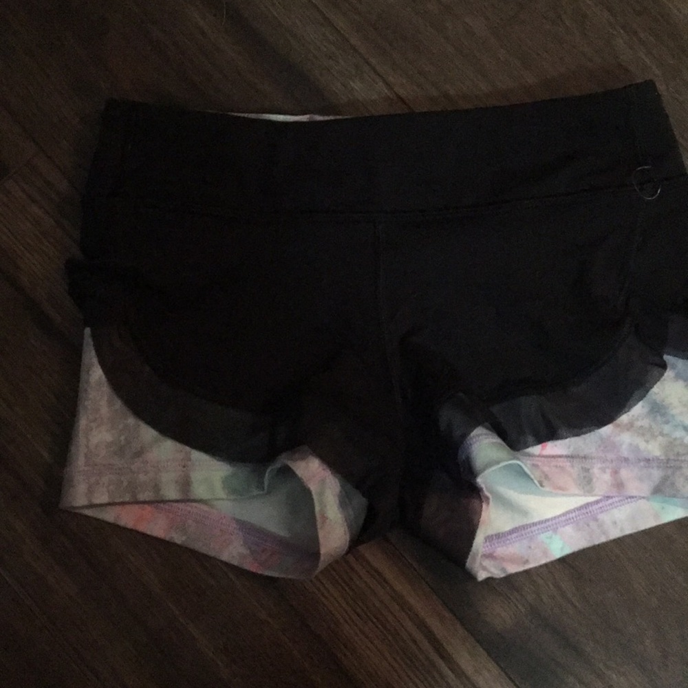Girls ivivva exercise shorts. Tight bike short with loose black shirt over top